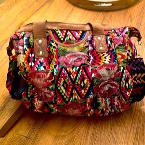 Nena & Co. Convertible bag. Straps included to made a shoulder bag or back pack.